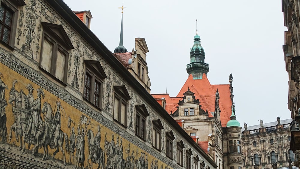 an old building with a clock tower in the background