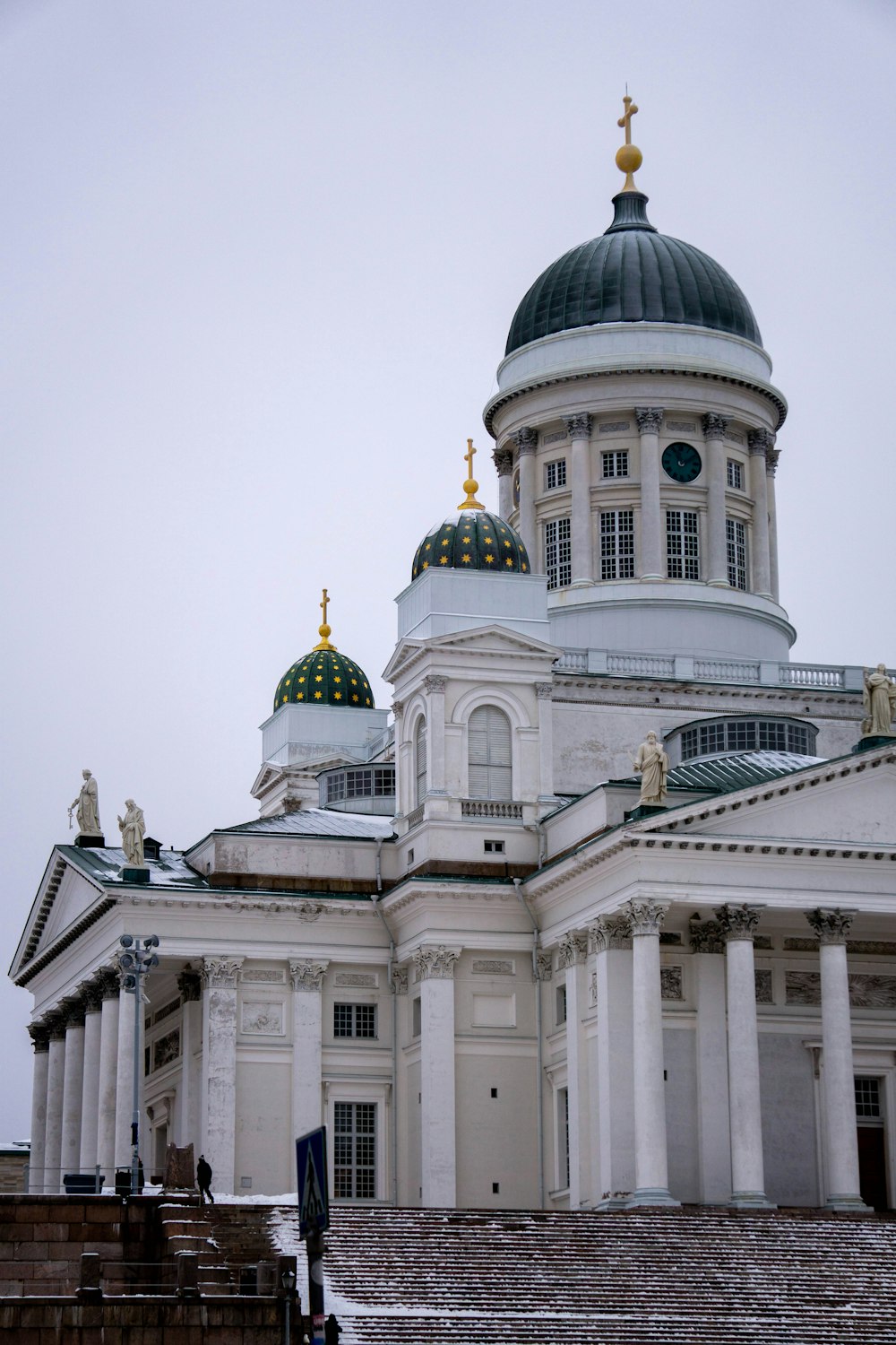 a large white building with a dome on top of it