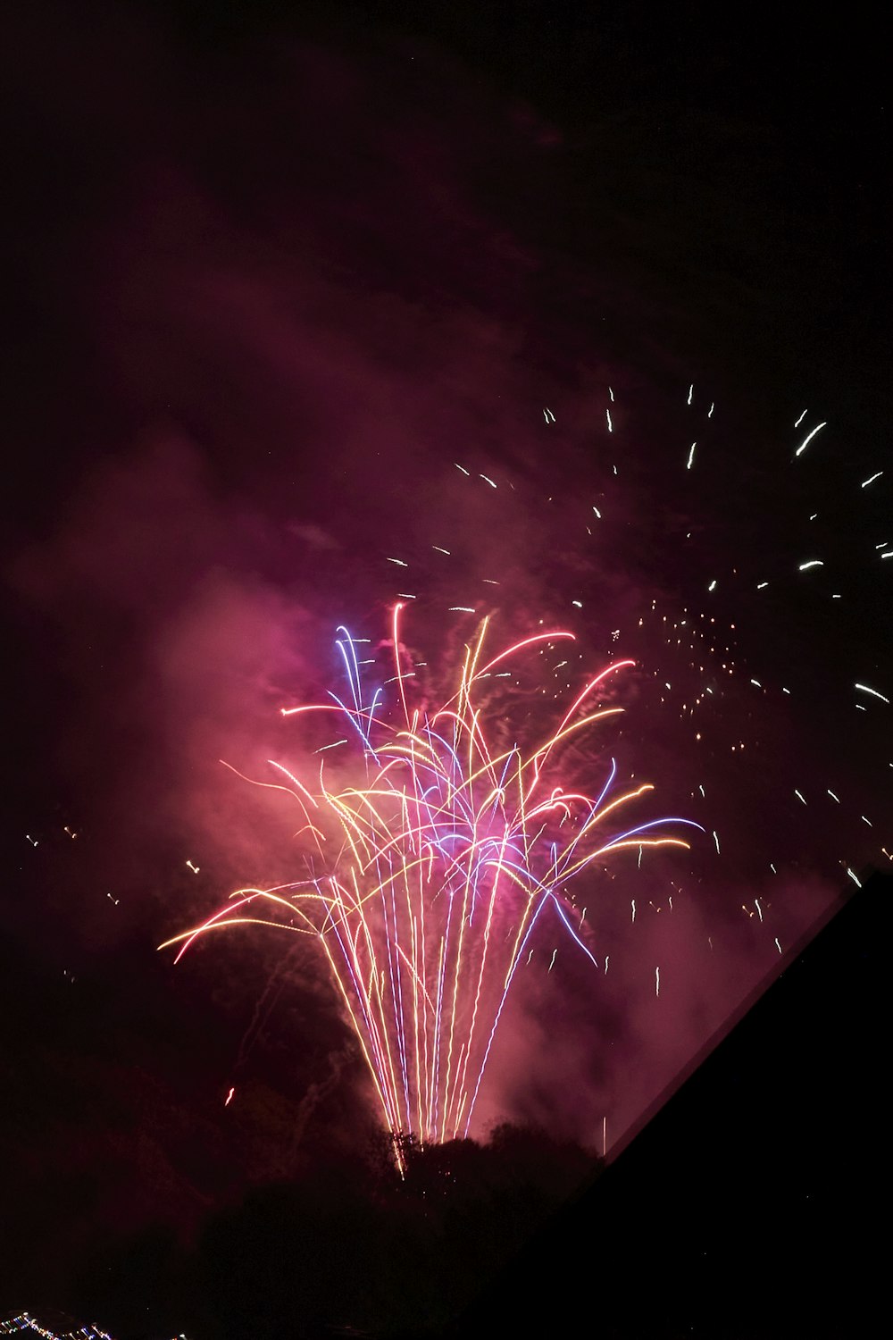 a colorful fireworks display in the night sky