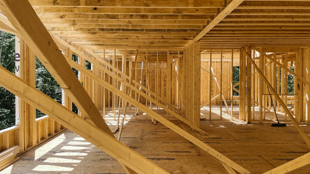 a house under construction with wooden framing