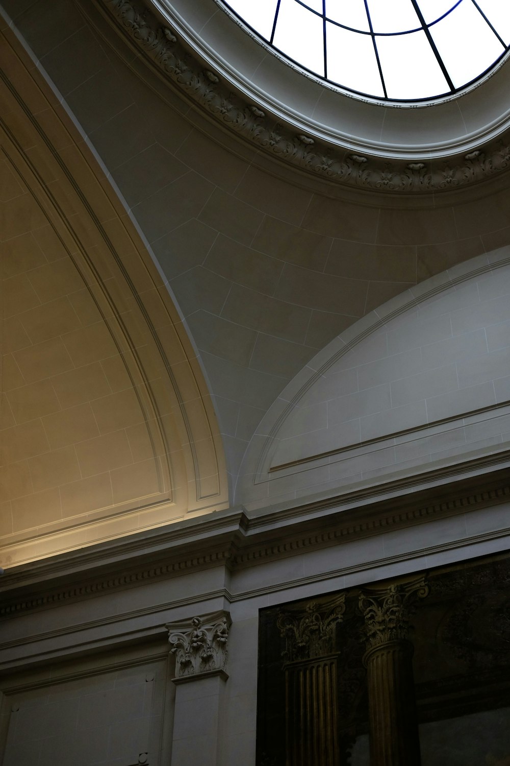 a large round window in the ceiling of a building