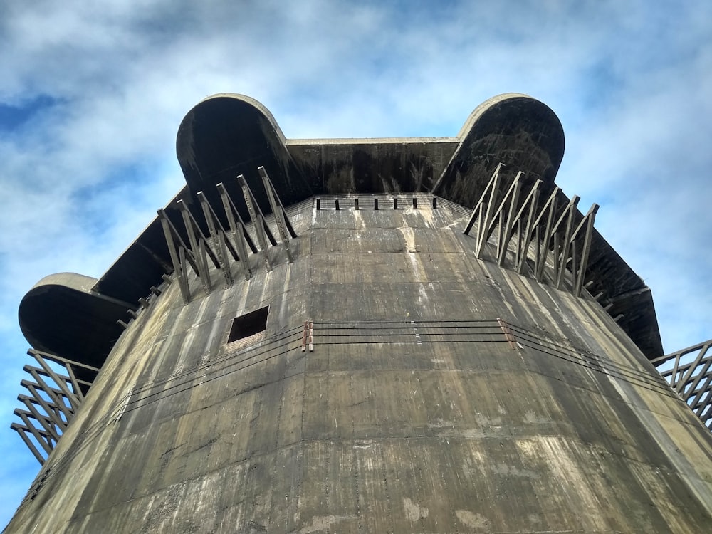 a very tall tower with a sky in the background