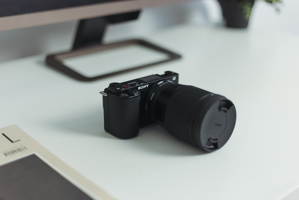 a camera sitting on top of a white desk