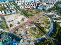 An aerial view of a completed urban renewal project highlighting new streets and parks.