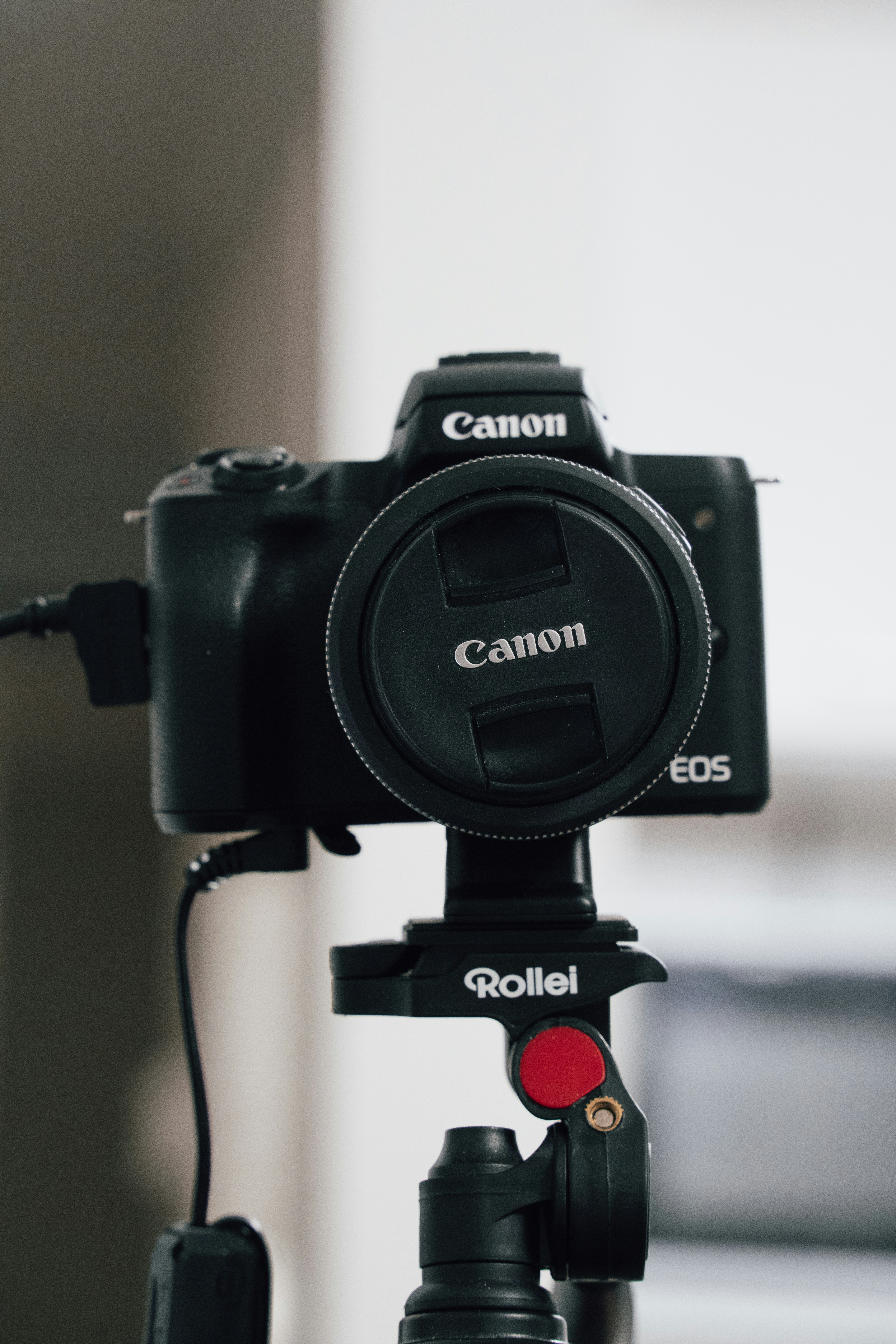 A streamer's desk setup with the JPod showing a 'LIVE' status.