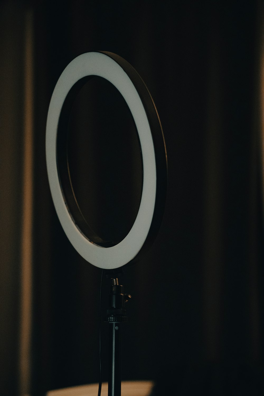 a close up of a ring light on a table