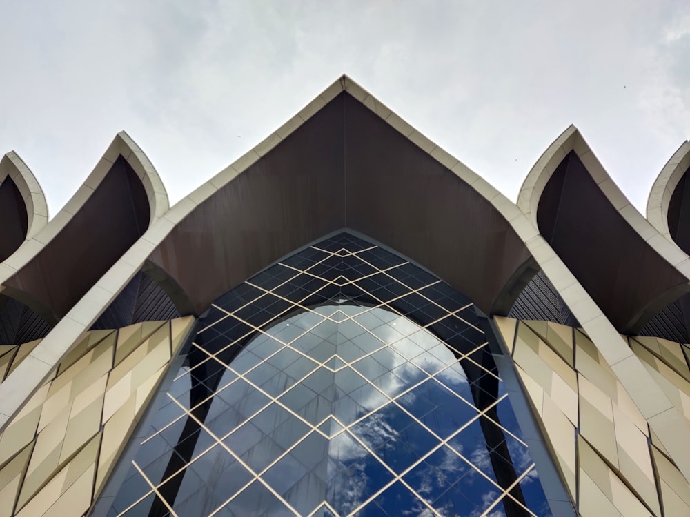 a very tall building with a sky in the background