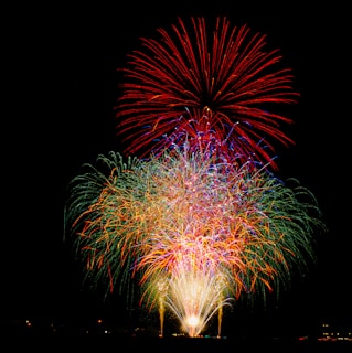 a colorful fireworks display in the night sky