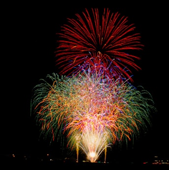 a colorful fireworks display in the night sky