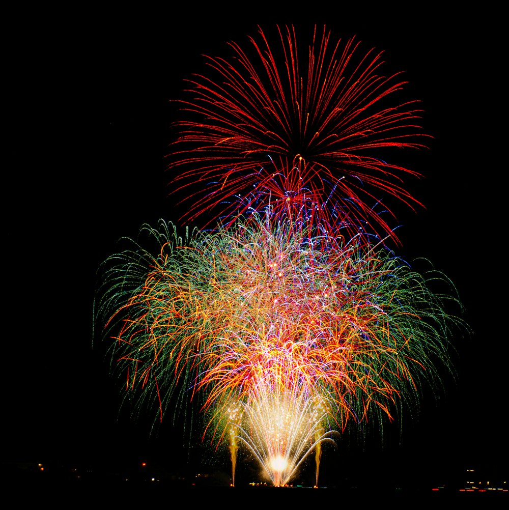 a colorful fireworks display in the night sky