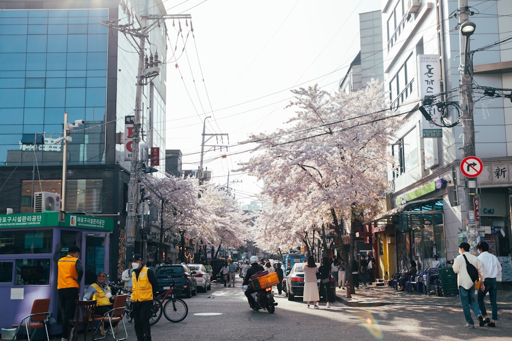 a busy city street filled with lots of people