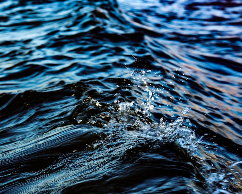a close up of a wave in the water