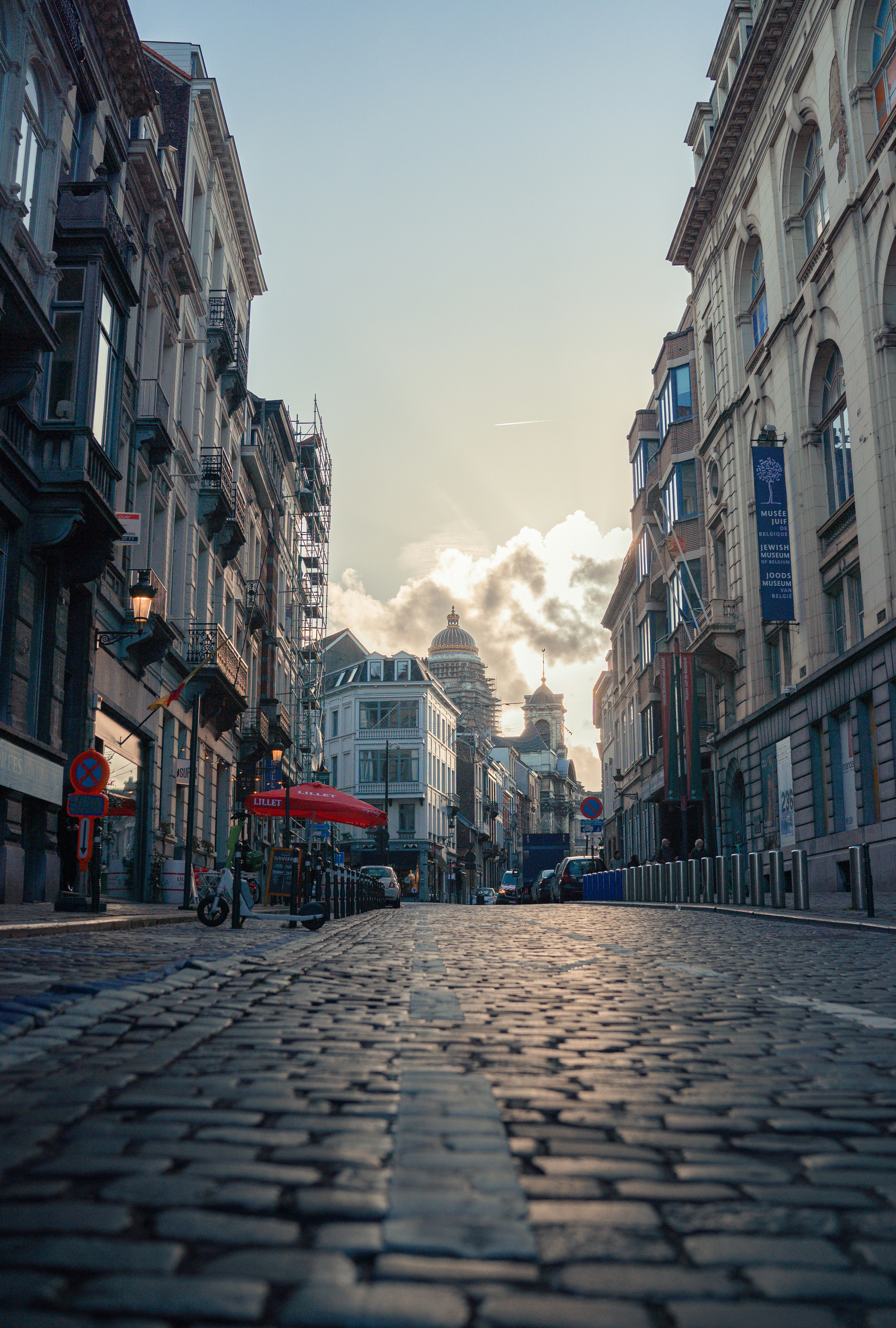 a cobblestone street in a european city