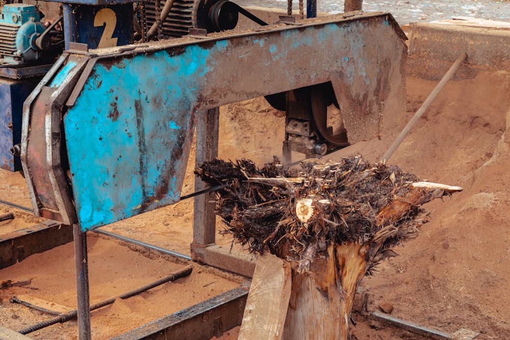 a machine that is sitting in the dirt