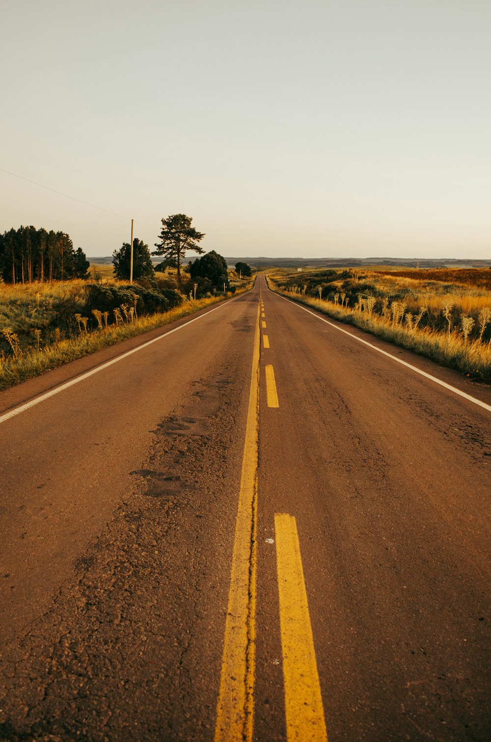 an empty road in the middle of nowhere