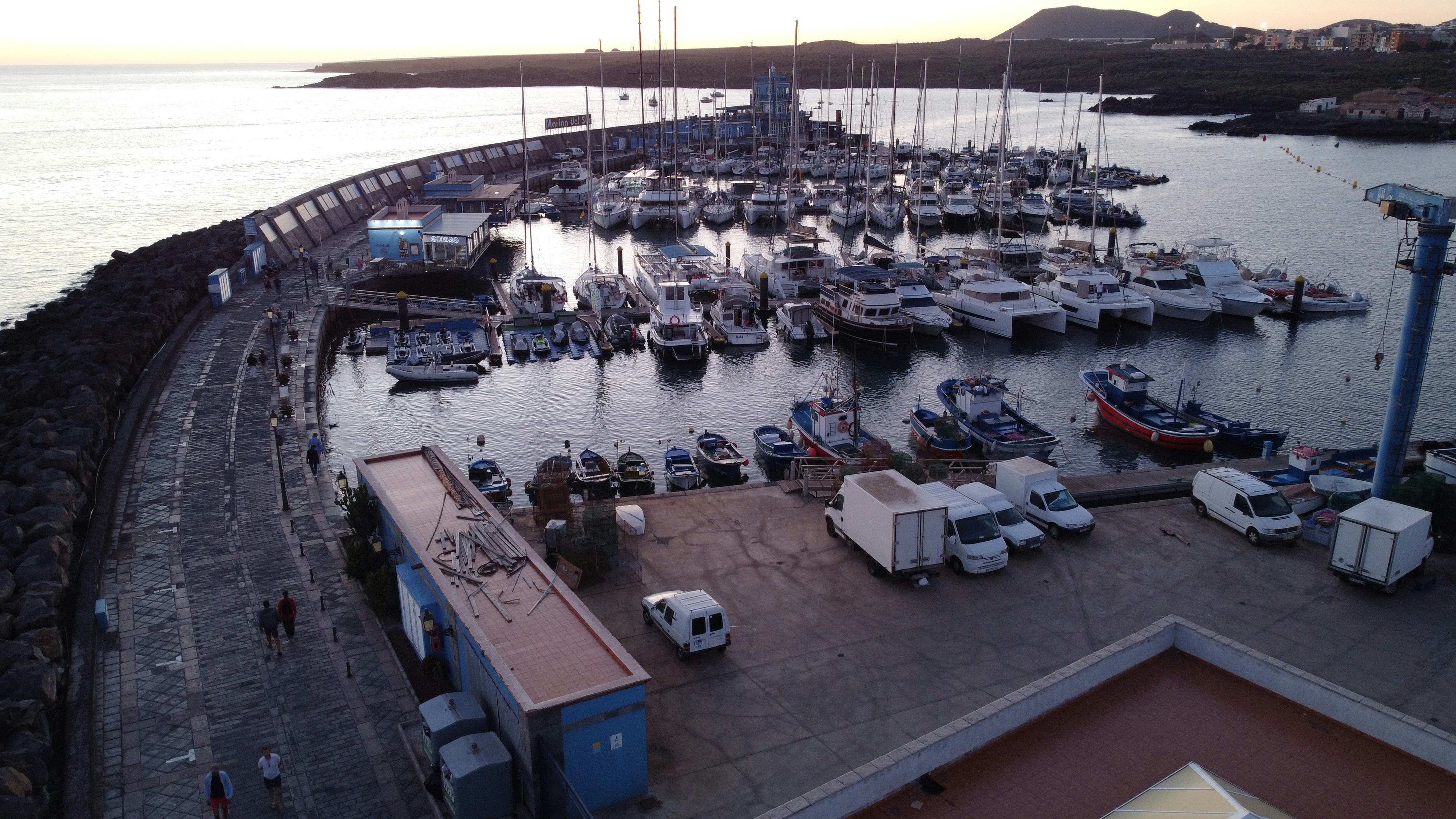 Photo of Las Galletas beach taken on Christmas 2022 as the sun starts to set at the end of the day. By the way, Las Galletas is a fantastic place. From DJI Mini 2 drone.