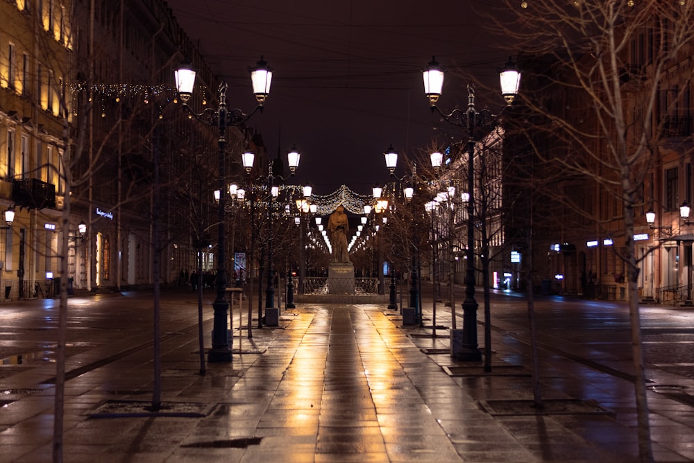 a city street at night with street lights