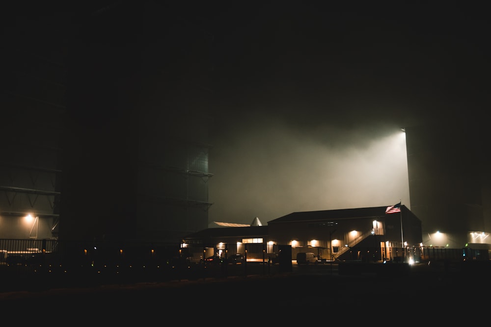 a stadium at night with lights shining on it