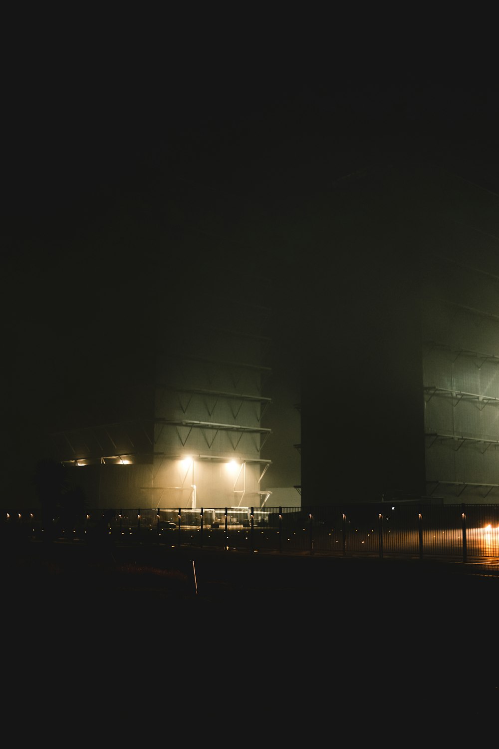 a stadium at night with the lights on