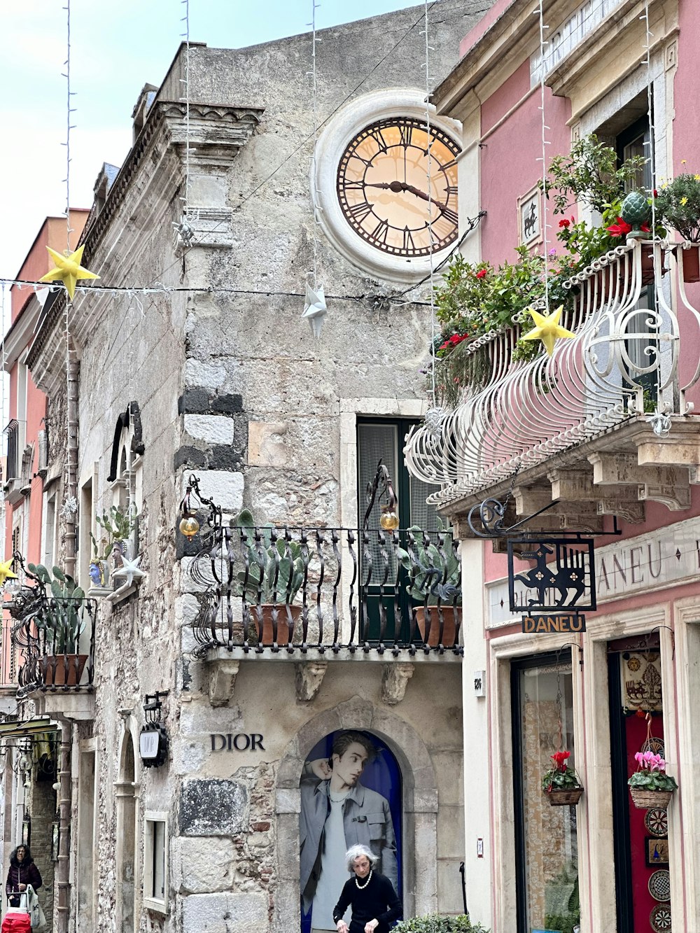 a building with a clock on the side of it