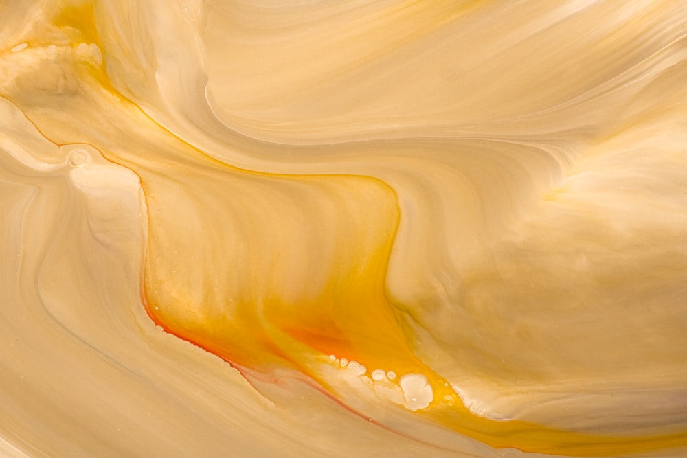 a close up of a yellow and white swirl