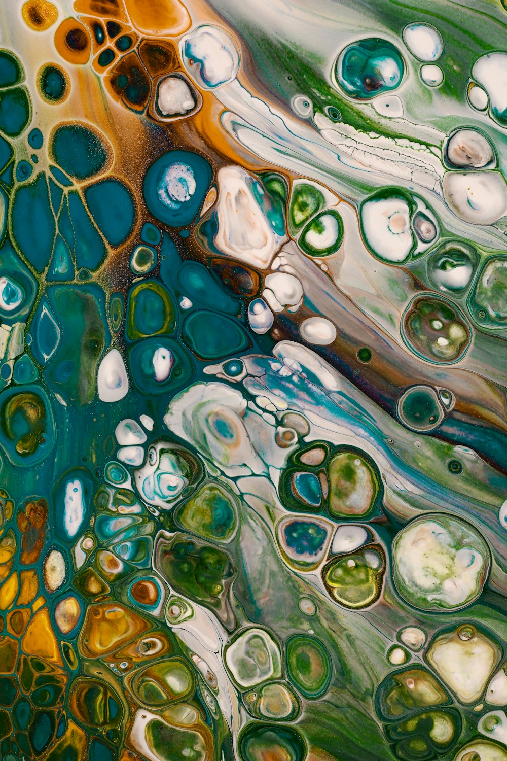 a close up of a painting with lots of bubbles