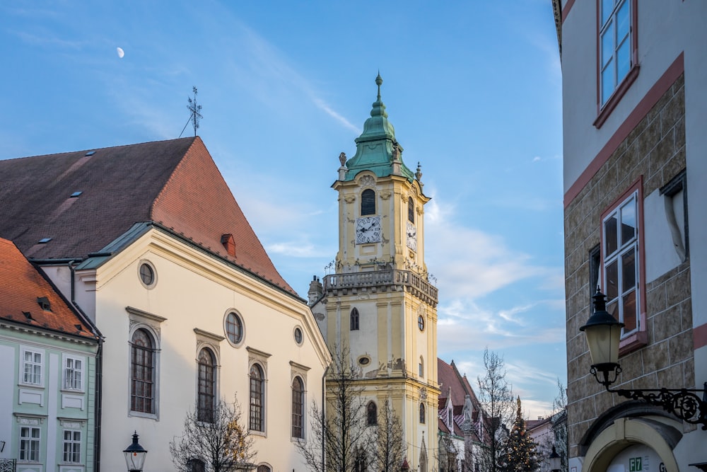 a tall clock tower towering over a city