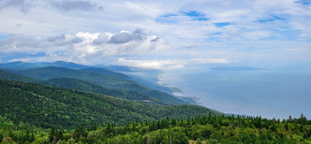 a scenic view of the mountains and the ocean