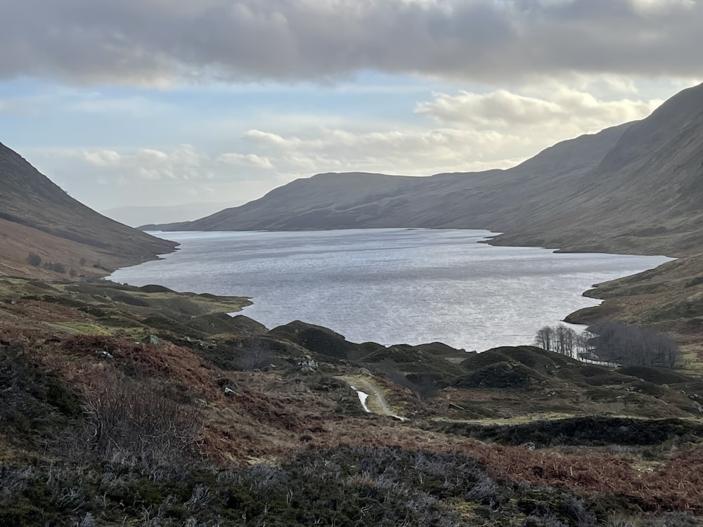 a large body of water surrounded by mountains