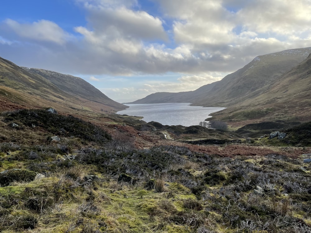 a large body of water surrounded by mountains