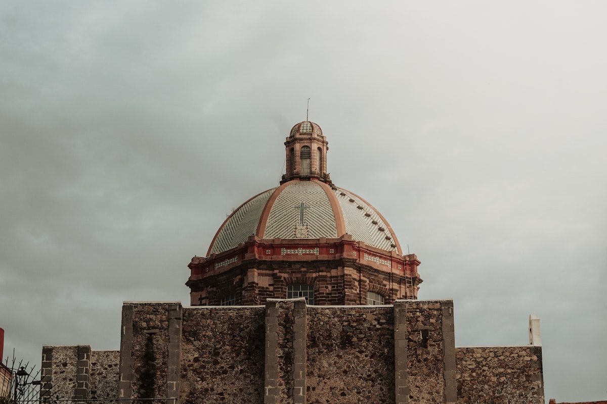 Baroque church dome and colonial architecture in San Miguel de Allende