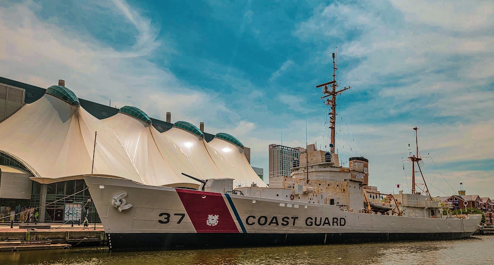 a large boat is docked in the water