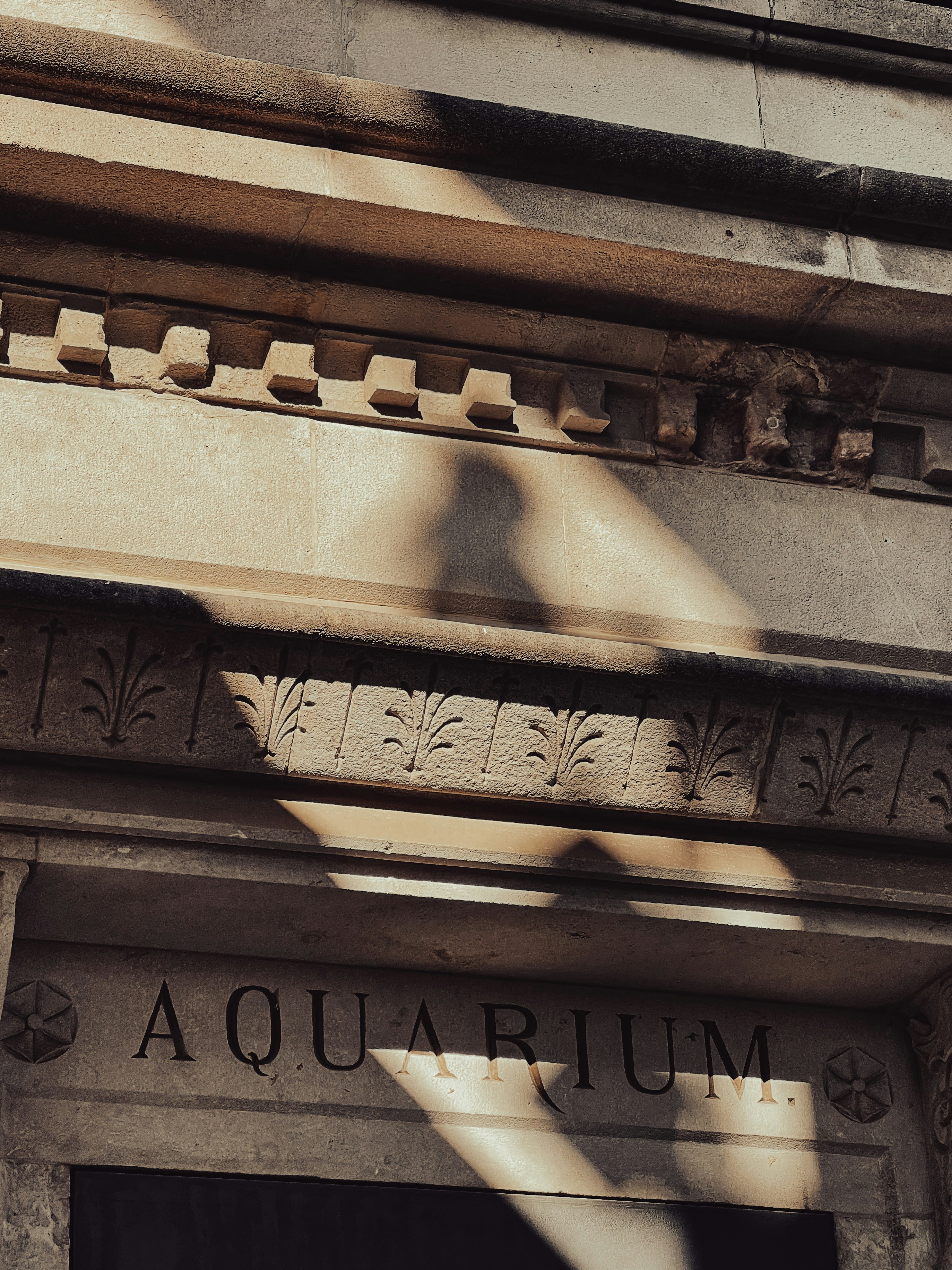 A building with a clock on the front of it photo – Free Symbol Image on