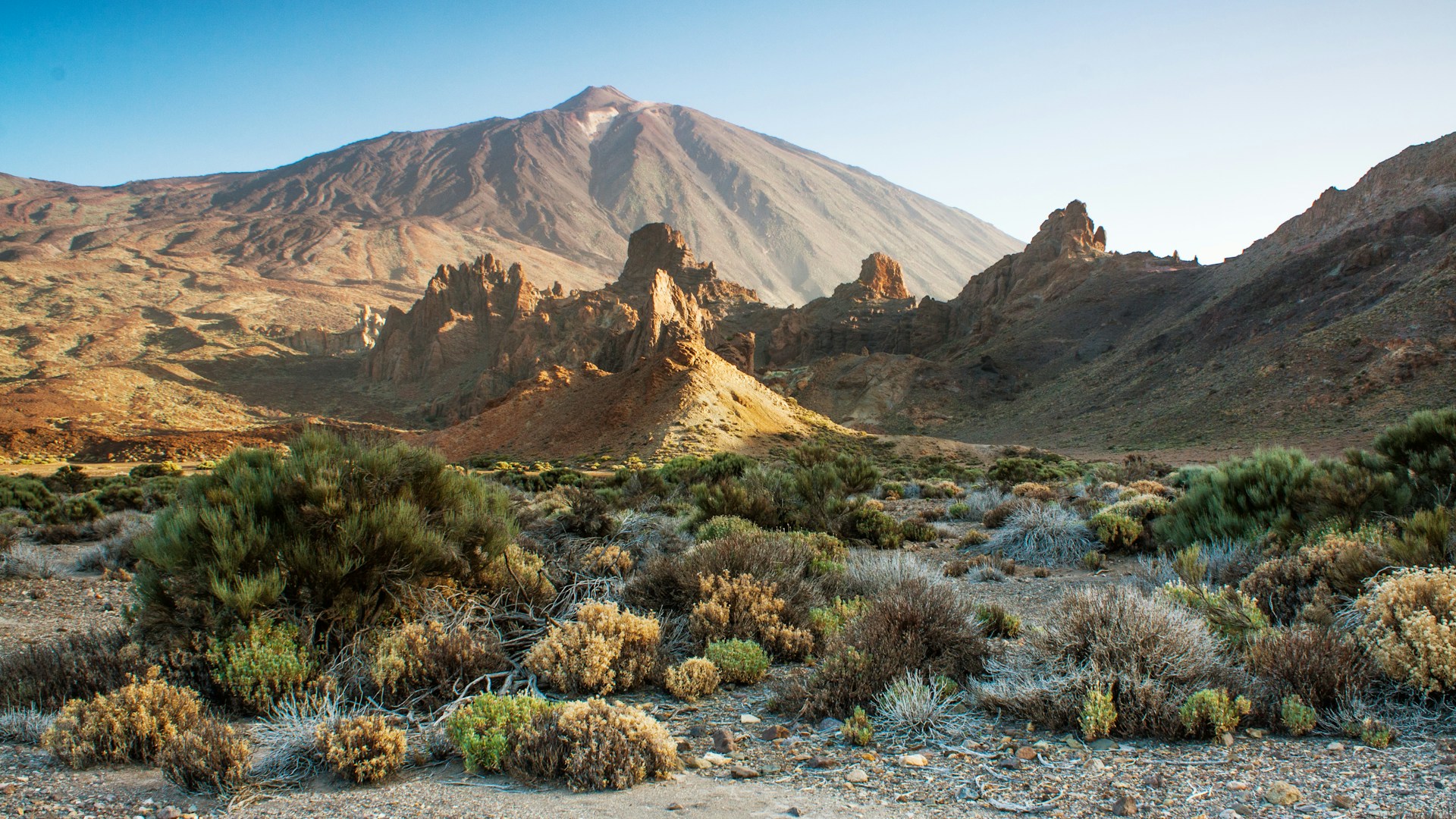 a mountain range in the middle of a desert