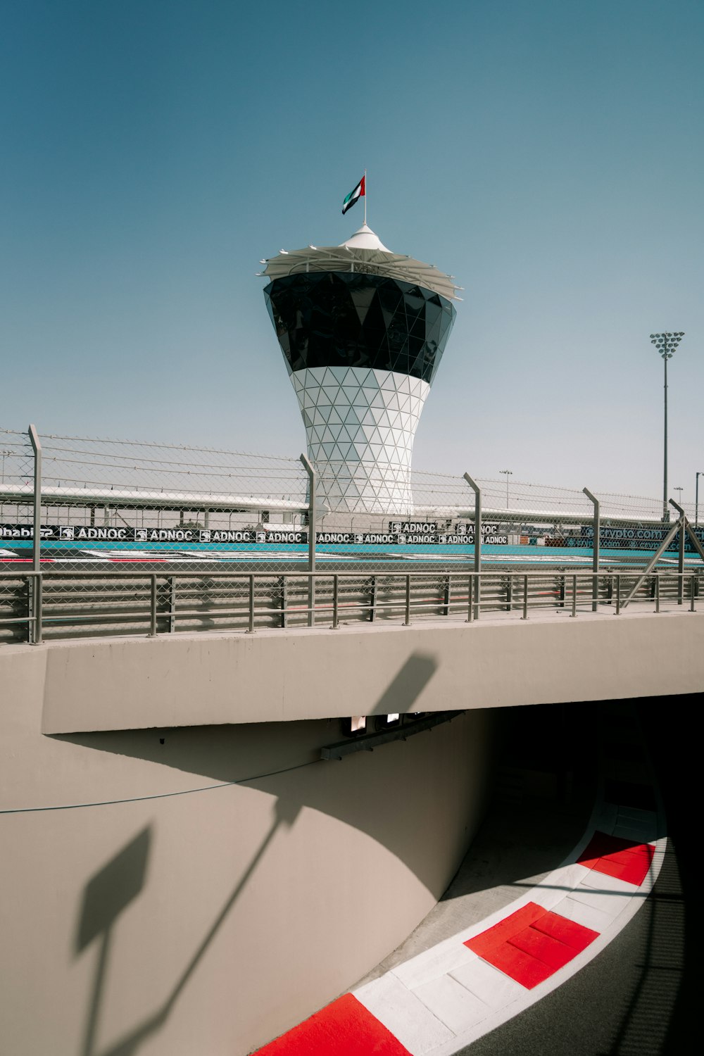 a view of a bridge with a tower in the background