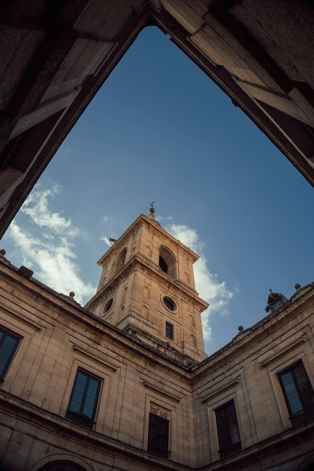 a tall clock tower towering over a city