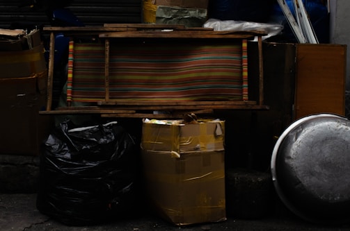 House clearance items such as furniture and appliances stacked together