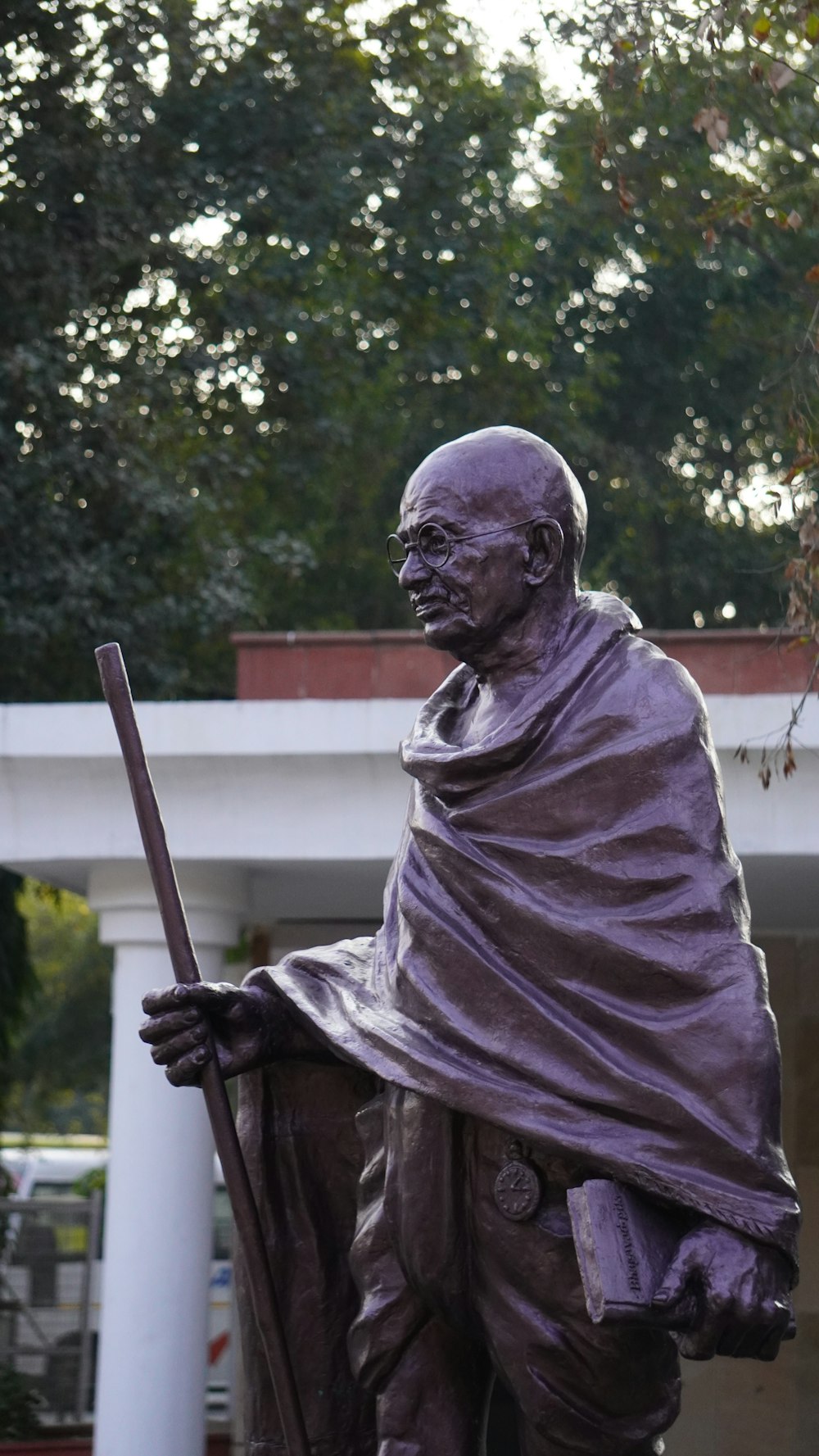 a statue of a man with a cane