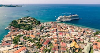 An aerial view of a vibrant cruise destination with clear blue waters.