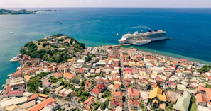 Happy travelers exploring a charming coastal town during a cruise shore excursion