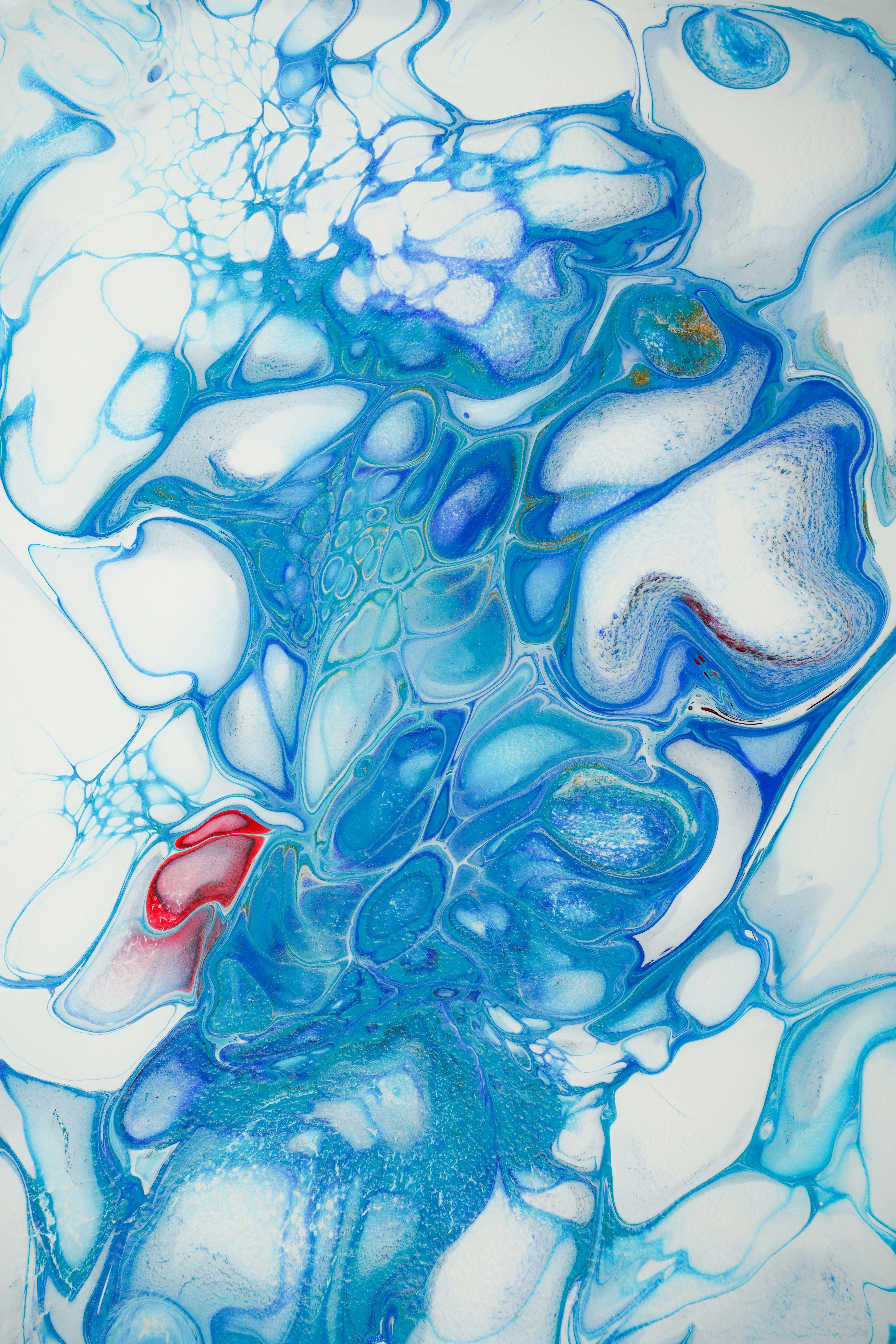 a painting with blue and red colors on it