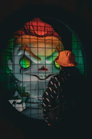 A sinister clown with glowing eyes lurking behind tattered carnival curtains.