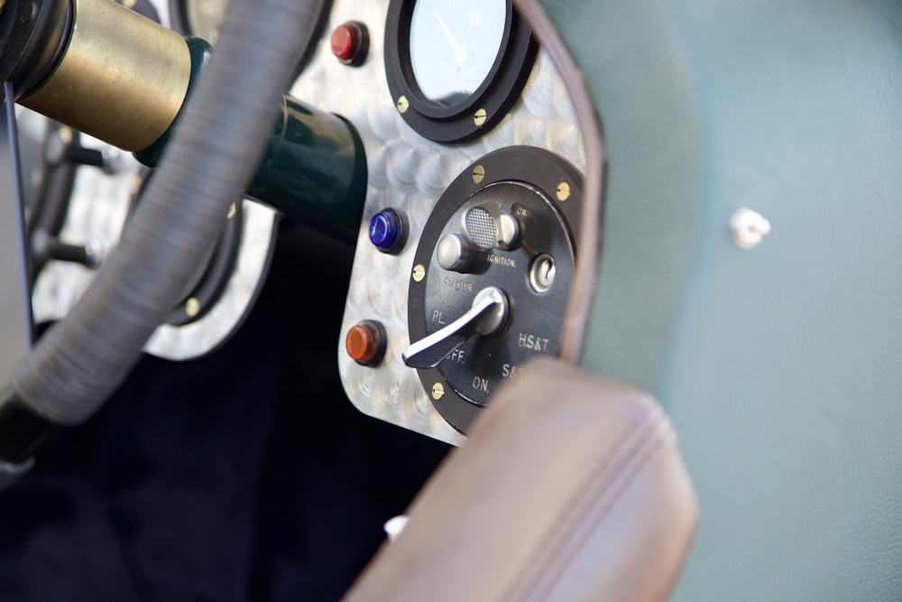 a close up of a steering wheel and dashboard of a car