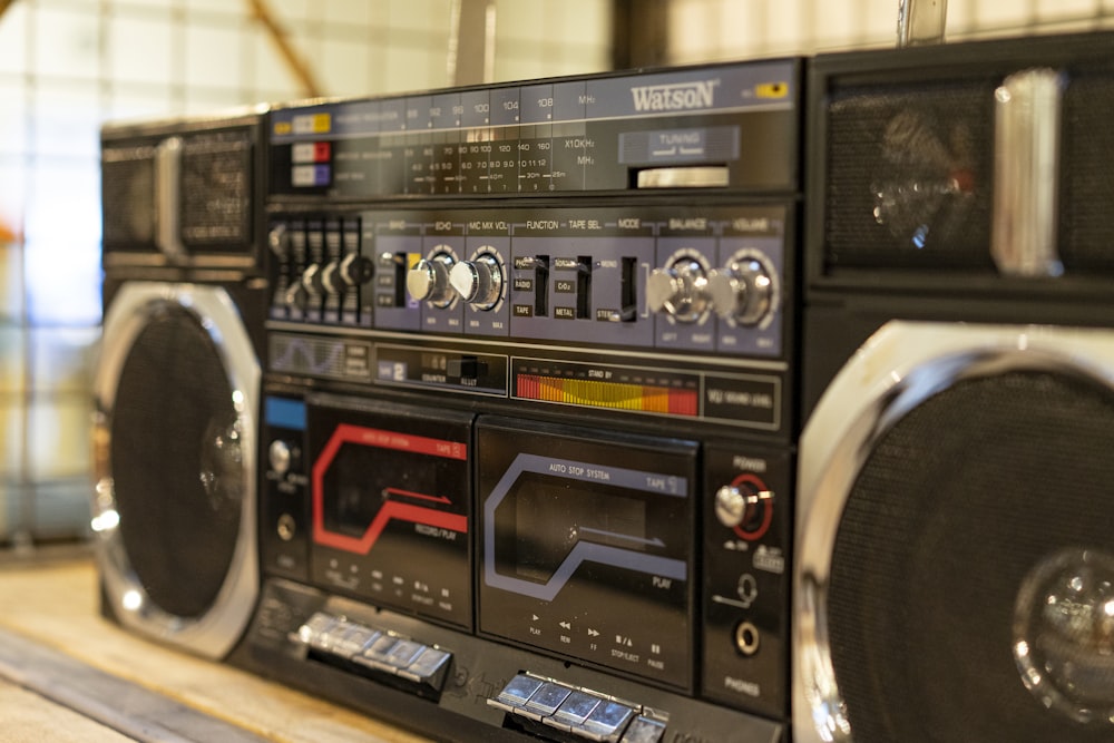 a boombox with a lot of electronics on top of it