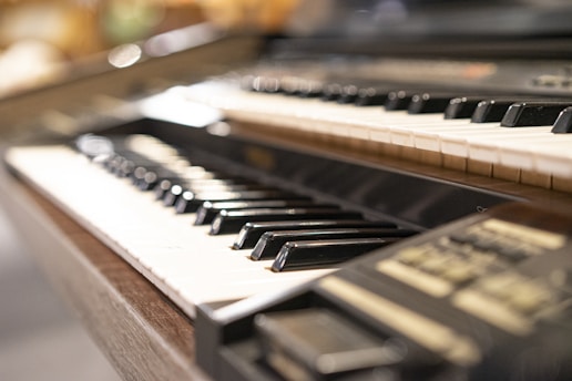 Close-up of vintage keyboard instruments emulated on a digital module.