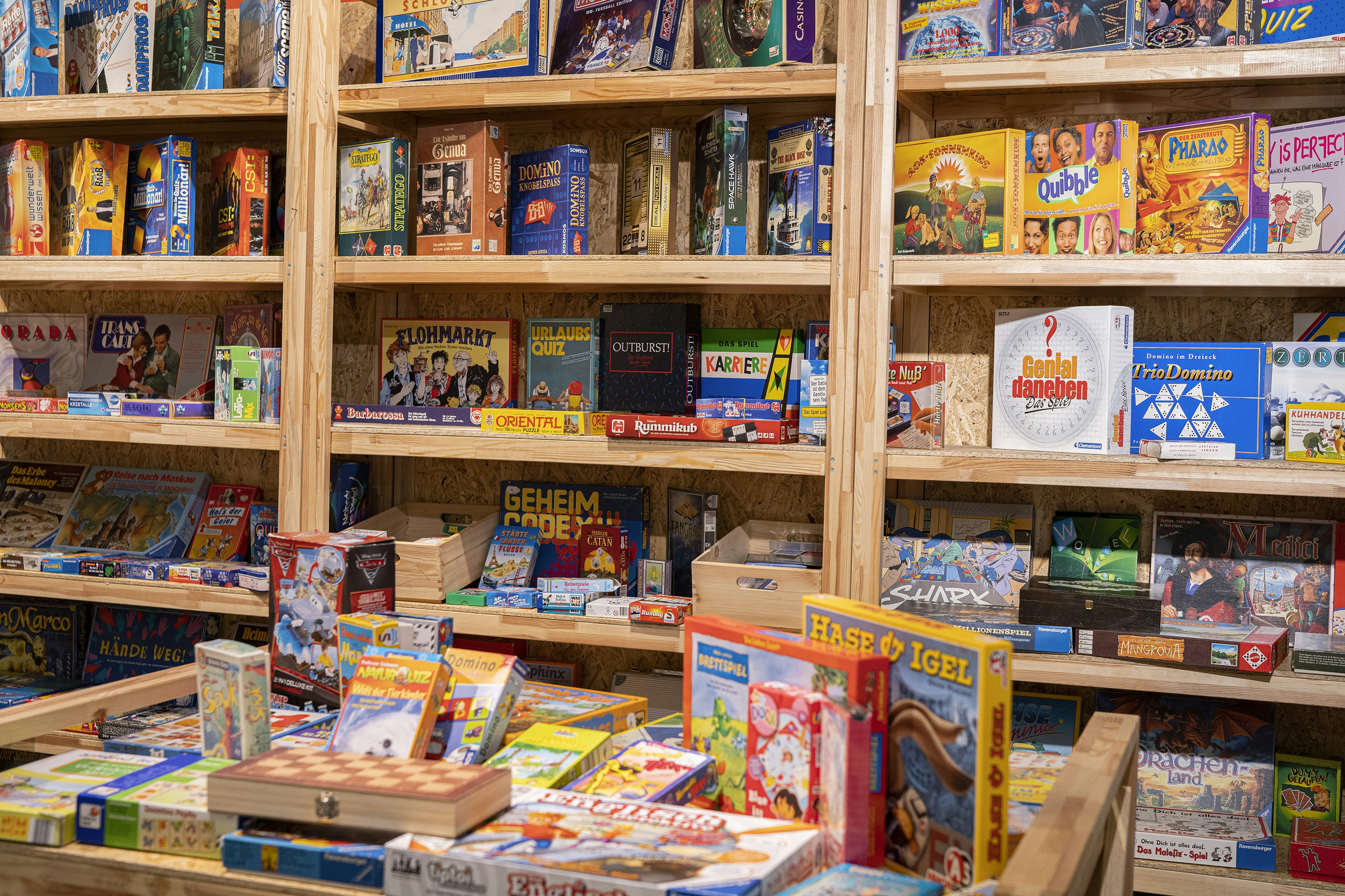a store filled with lots of wooden shelves filled with toys