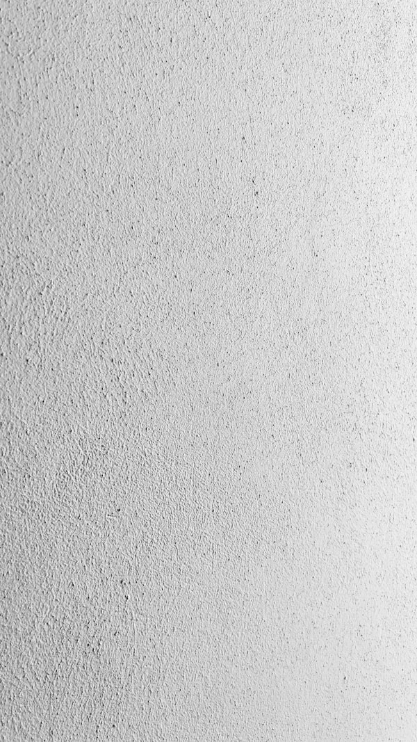 Perfectly smooth white plastered wall