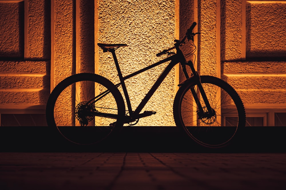 a bike is parked in front of a building