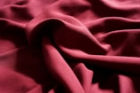 a close up view of a red fabric
