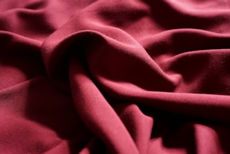 a close up view of a red fabric